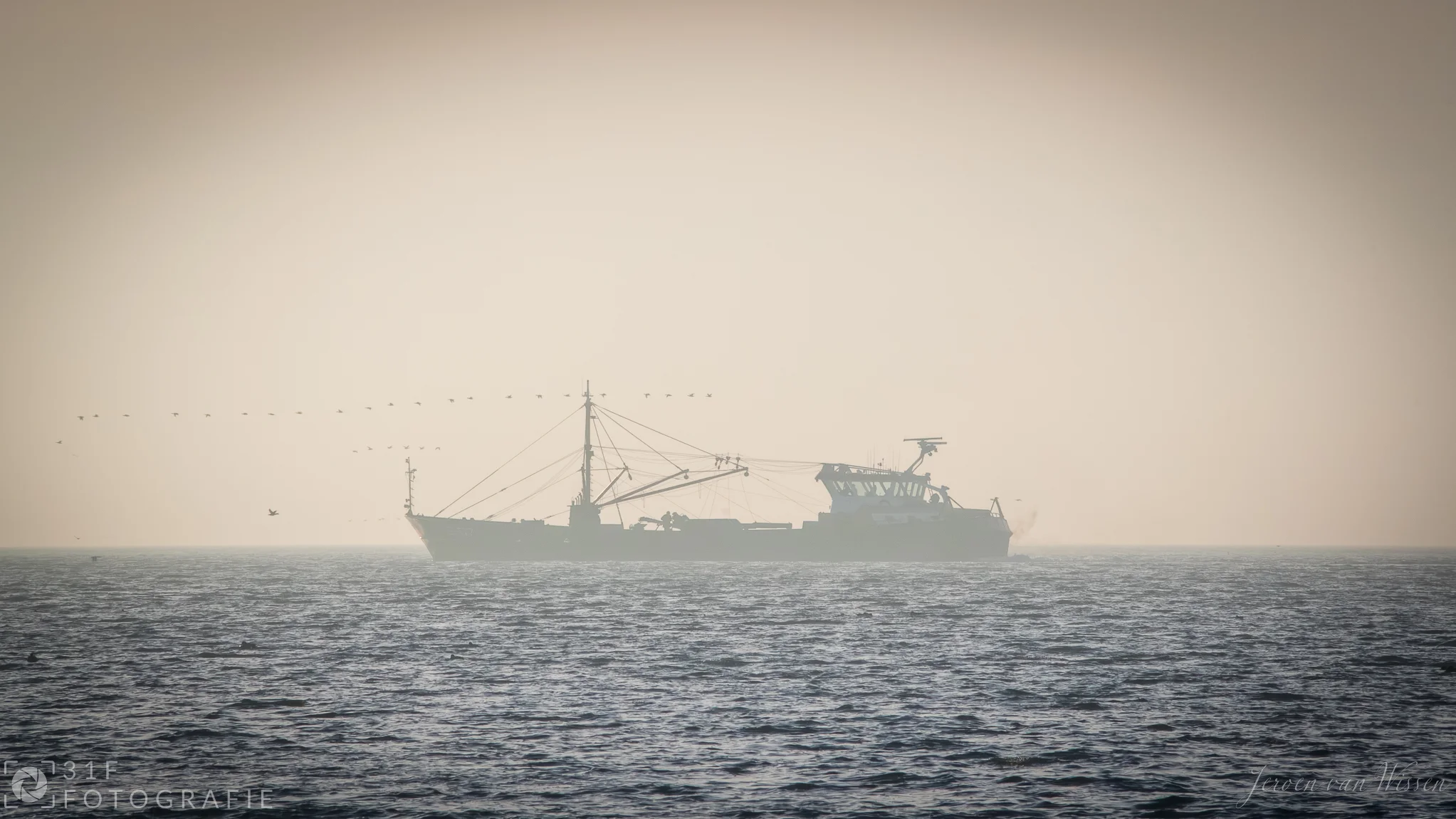 Fishermen in the fog near Terschelling